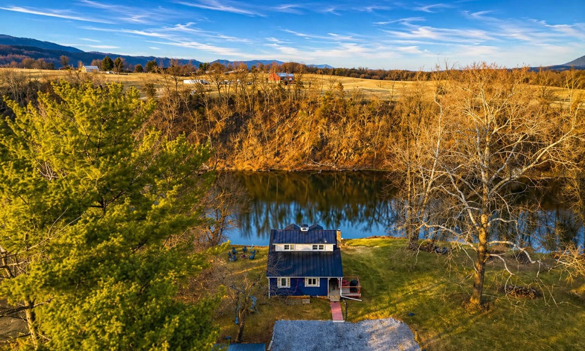 Elkton House | Dreamy riverfront home with sandy beach, hot tub, fire pit, kayaks & fishing
