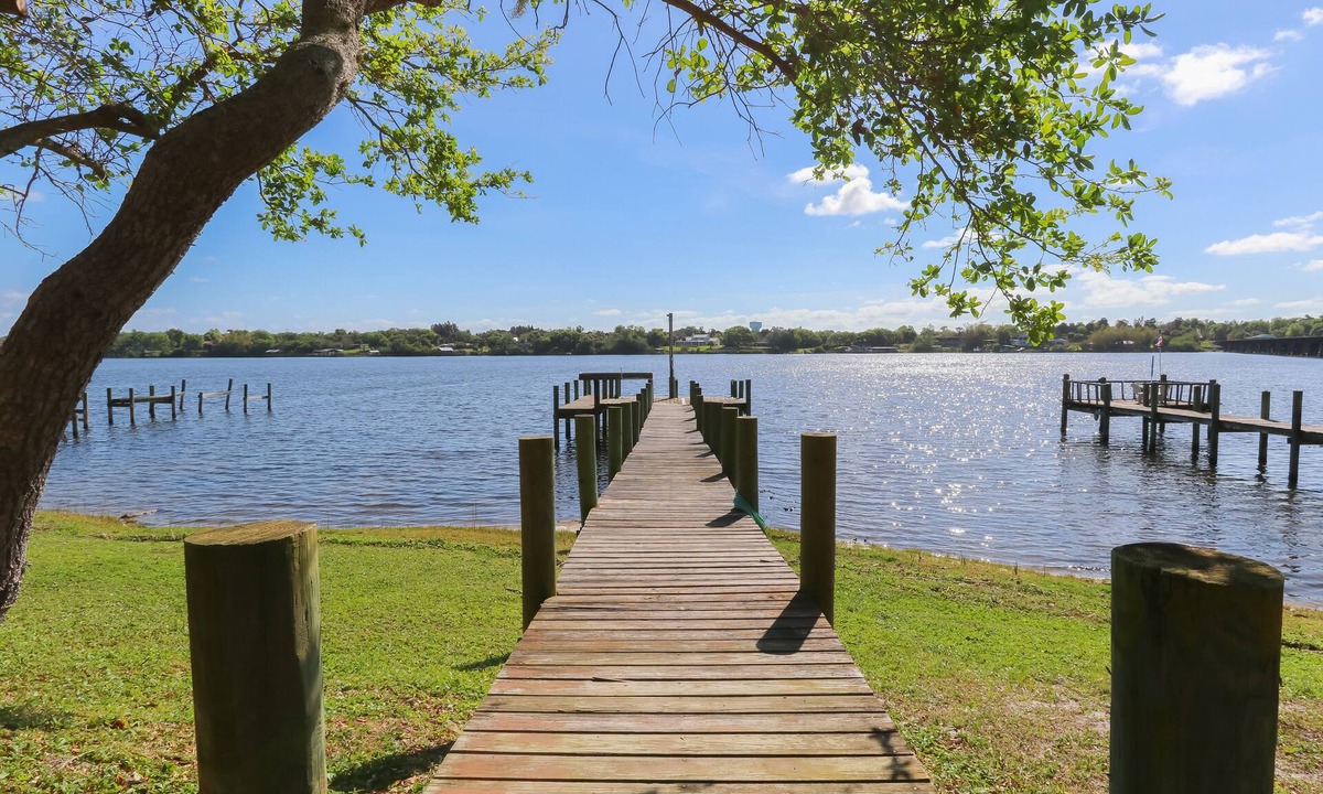 Sebastian House | Riverfront Retreat, Private Docks, on Small Acreage.