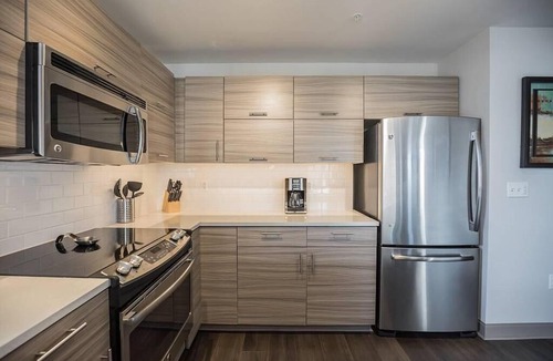 Midtown Village Apartment | Bright 2BR home steps away from City Hall