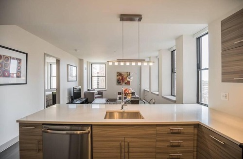 Midtown Village Apartment | Bright 2BR home steps away from City Hall