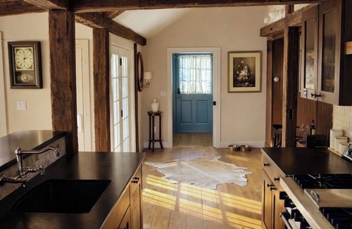 Patterson House | Classic Red Farmhouse Retreat by Nature Preserve