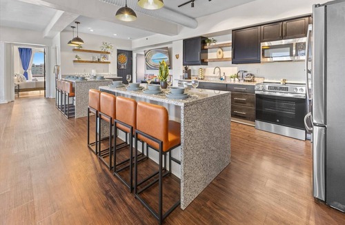Wholesale District Apartment | Downtown Indy Double Unit Penthouse Near ICC