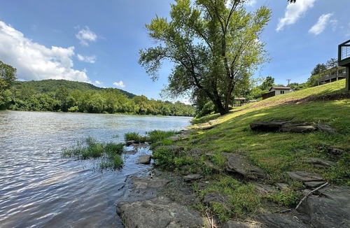 Ronceverte House | Gound level and private home with river front access.