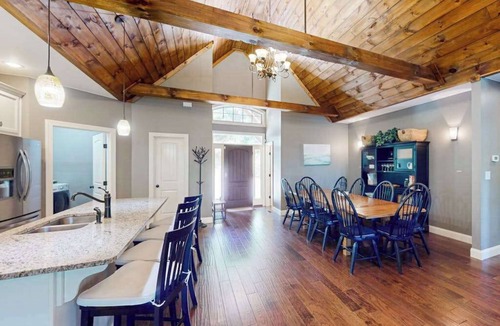 Lake Lure House | Lakefront retreat with private beach, games, dock & kayaks