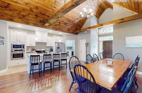 Lake Lure House | Lakefront retreat with private beach, games, dock & kayaks