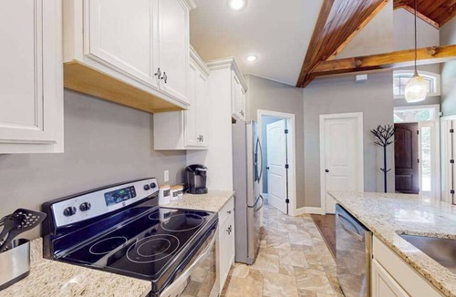 Lake Lure House | Lakefront retreat with private beach, games, dock & kayaks