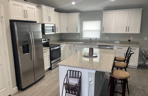 Indian River Estates House | New modern 3-bed 2 bath house with smart TV's in every room, WIFI, and hot tub
