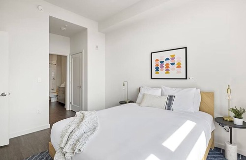 Bluemont Hotel | Relax at Spacious Apartment w/Full Kitchen & Rooftop Access | Landmarks Nearby
