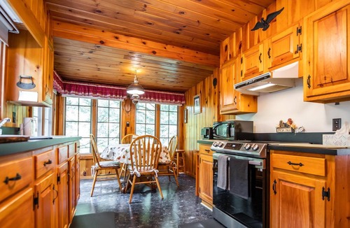 Laporte House | Relax on the covered porch at "J.C.'s Bunkhouse" at Lake Mokoma