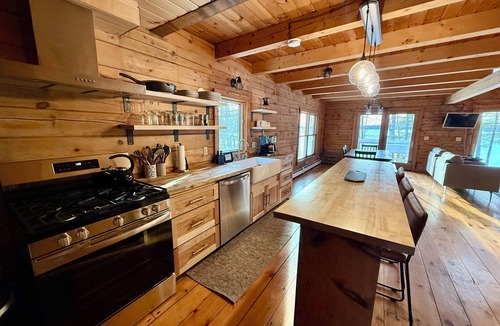 Dresden Cabin | Rustic Riverfront Cabin with Fire pit and Wood Stove