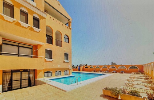 Roquetas de Mar Apartment | SPACIOUS BEACH ACCOMODATION for 10-12 with POOL-PORCH-WIFI-WALKING POOL-SERVICE