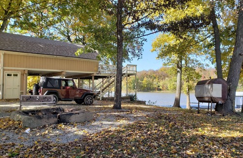 Cannelton Cabin | The Point is a waterfront rental with covered boat dock at Rocky Point Indiana