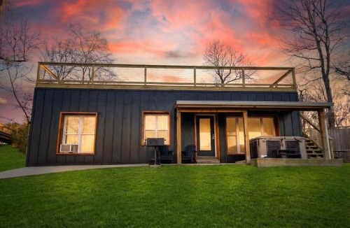 Bryant House | This is IT Cabin with a hot tub fire pit & indoor pool