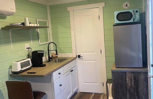 Tellico Plains Cabin | This unique tiny home has its own private pickleball court!