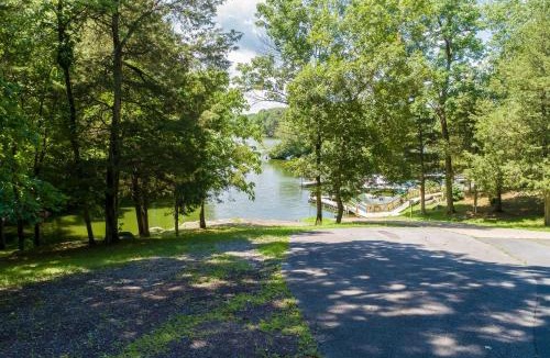 Livingston House | Three-story dog-friendly home with large deck, wood swing, firepit, lawn, & more