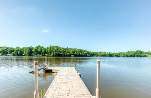 Orange House | Two-story, lakefront getaway with dock, beach, grill, 2 kayaks, 2 canoes, AC