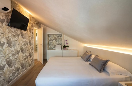 Fogliano Marina Apartment | Villa Pra-tu - Mansarda Moderna 2 Camere - P r a t u r e c c i Group