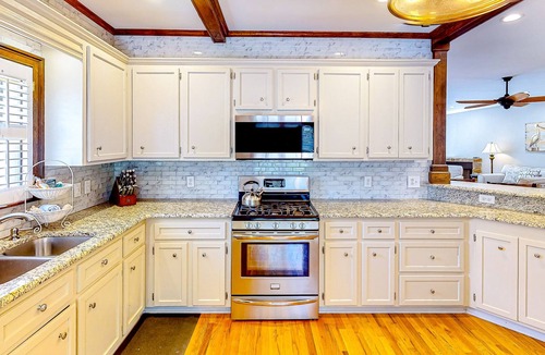 Leesville House | Waterfront home with private dock, boat ramp, large deck, grill, & W/D