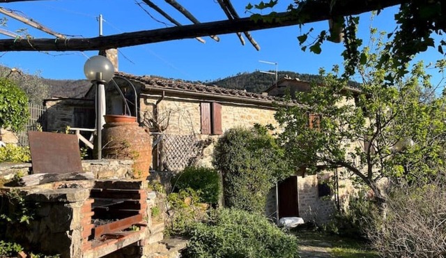 Ancient Tuscan style country house with a view of the Pisan Mountains