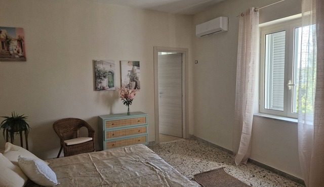 Apartment 'L'Orchidea' with Private Garden, Wi-Fi and Air Conditioning