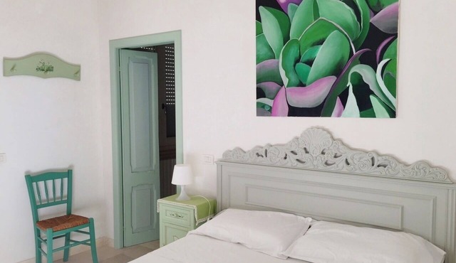 Beachfront apartment with garden