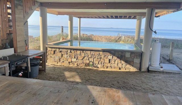 Beachfront home with heated pool