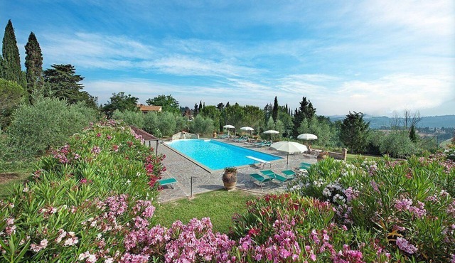 Casa Canarino E: A welcoming apartment surrounded by the greenery.