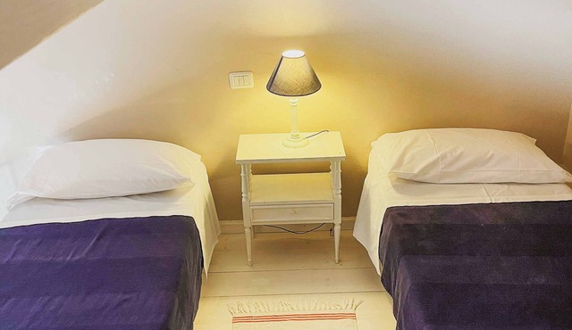 "Castle" apartment with one double room and two single beds