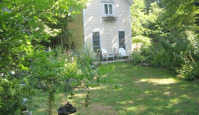 Charming, river front compound