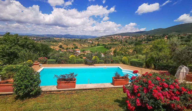 Enjoy the fantastic view in this inviting vacation home with pool.