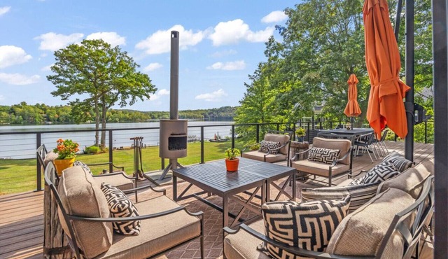Lake Front Home with Private Beach Dock Golf and Views