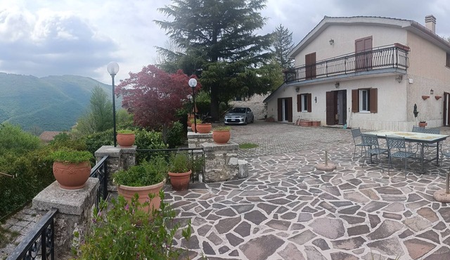 LOOKS OUT ON THE ANENE VALLEY IN FRONT OF SIMBRUINI MOUNTAINS