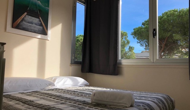 Mini apartment a stone's throw from the beach with parking space
