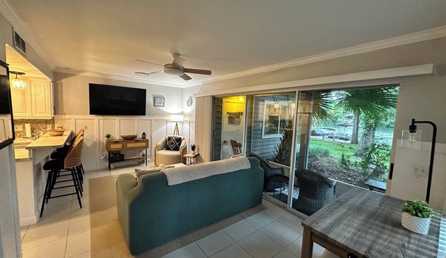 RIVER FRONT-NEWLY LISTED-1ST FLOOR-Screen Porch-NEAR RAINBOW RIVER! Pool & Kayak