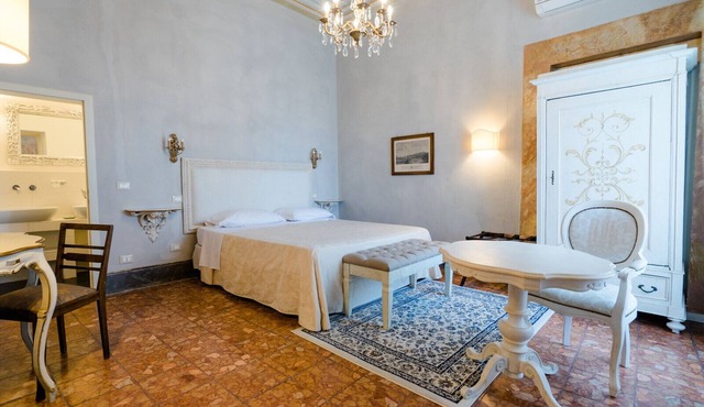 Romantic master bedroom in 18th-century villa