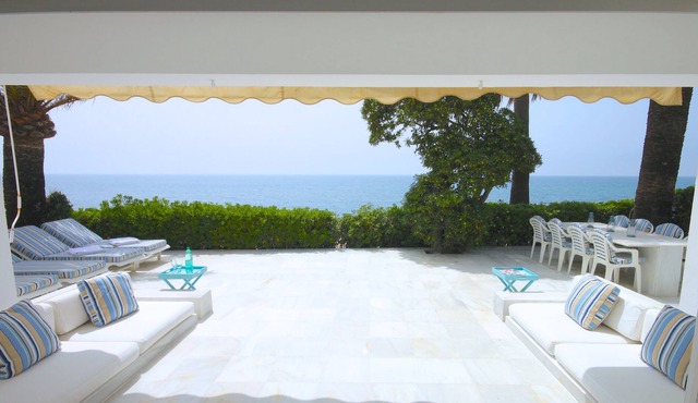 Sun-filled Front line beach villa in Marbella